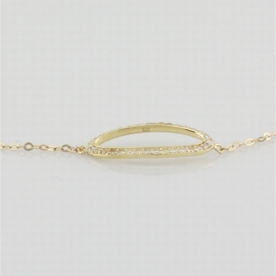 9k yellow gold bracelet with open oblong in white cz
