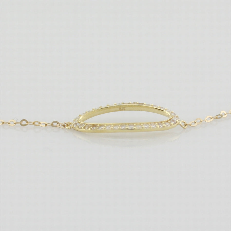 9k yellow gold bracelet with open oblong in white cz