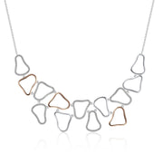 sterling silver open cluster necklace with rose gold accents