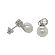 silver push back earrings decorated with freshwater pearls and cz